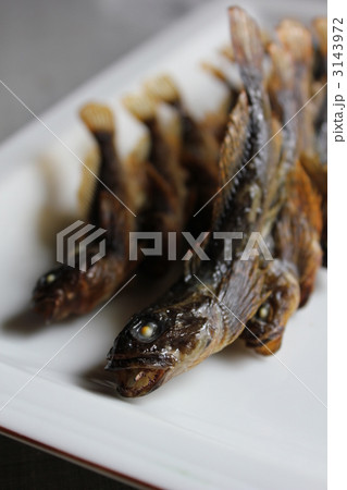 焼き魚 串焼き カジカ 川魚料理の写真素材