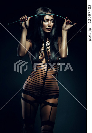 cruel bdsm woman with whip - Stock Photo [12997399] - PIXTA