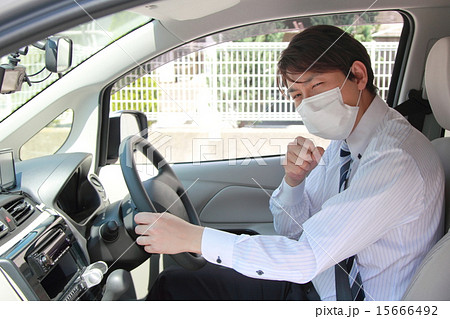 営業 車 運転 風邪の写真素材