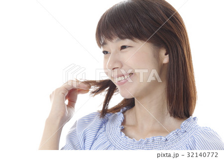 手櫛 かきあげるの写真素材