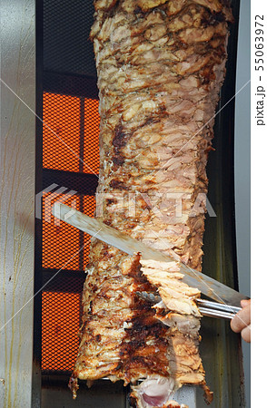 削ぐ ケバブ 肉料理の写真素材