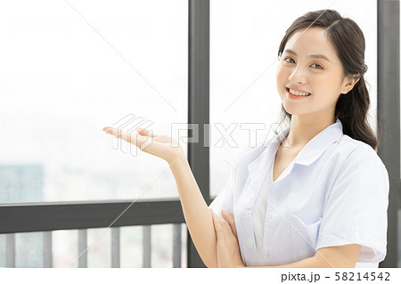 Sexy nurse with big breasts in hospital. - Stock Photo [58603603