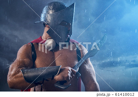 Muscular Spartan Looking At Blade の写真素材