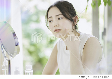 A beautiful young woman with very large natural - Stock Photo [78096796]  - PIXTA