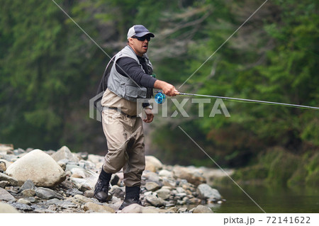 Creating the perfect fishing tackle. Shot of a man making fishing