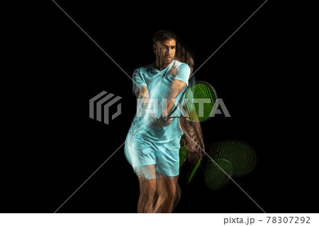 One man, professional tennis player isolated on black background in mixed neon light. Stroboscope