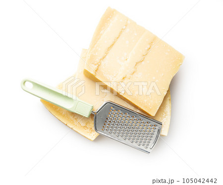 Premium Photo  Tasty cheese block and cheese grater isolated on white  background